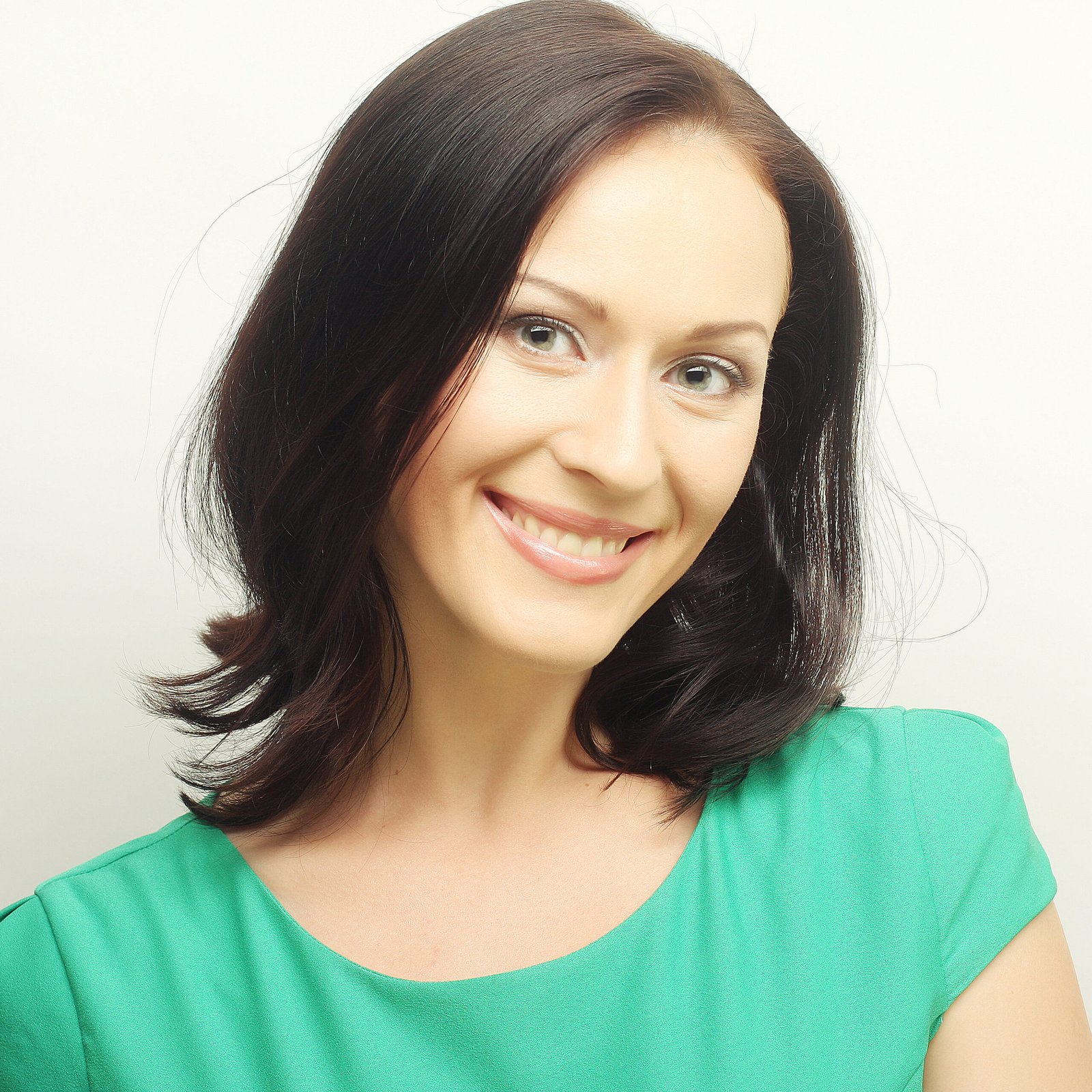young woman with big happy smile