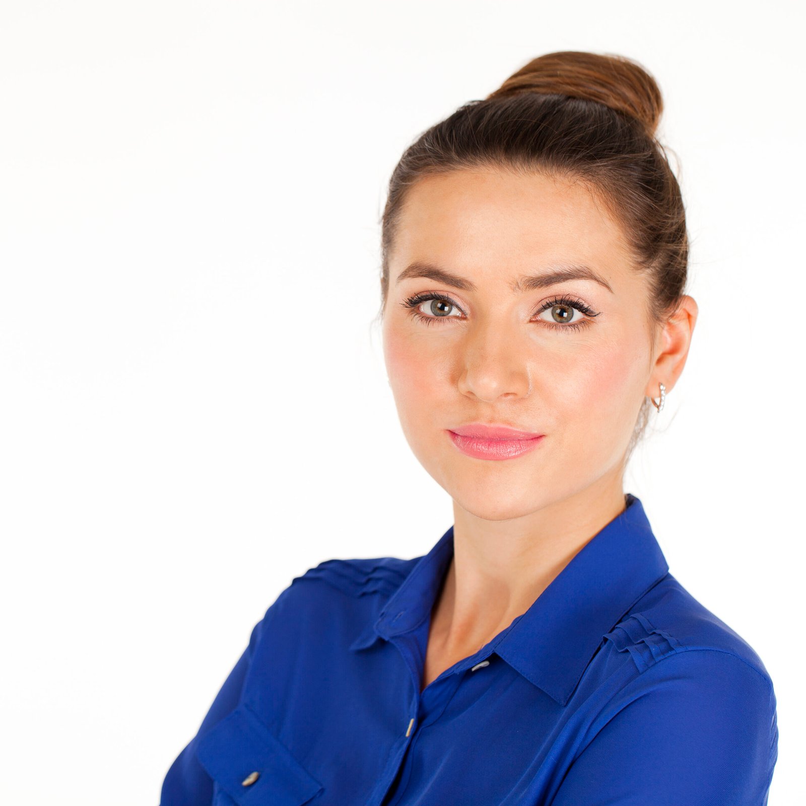 portrait of a beautiful happy woman in blue shirt
